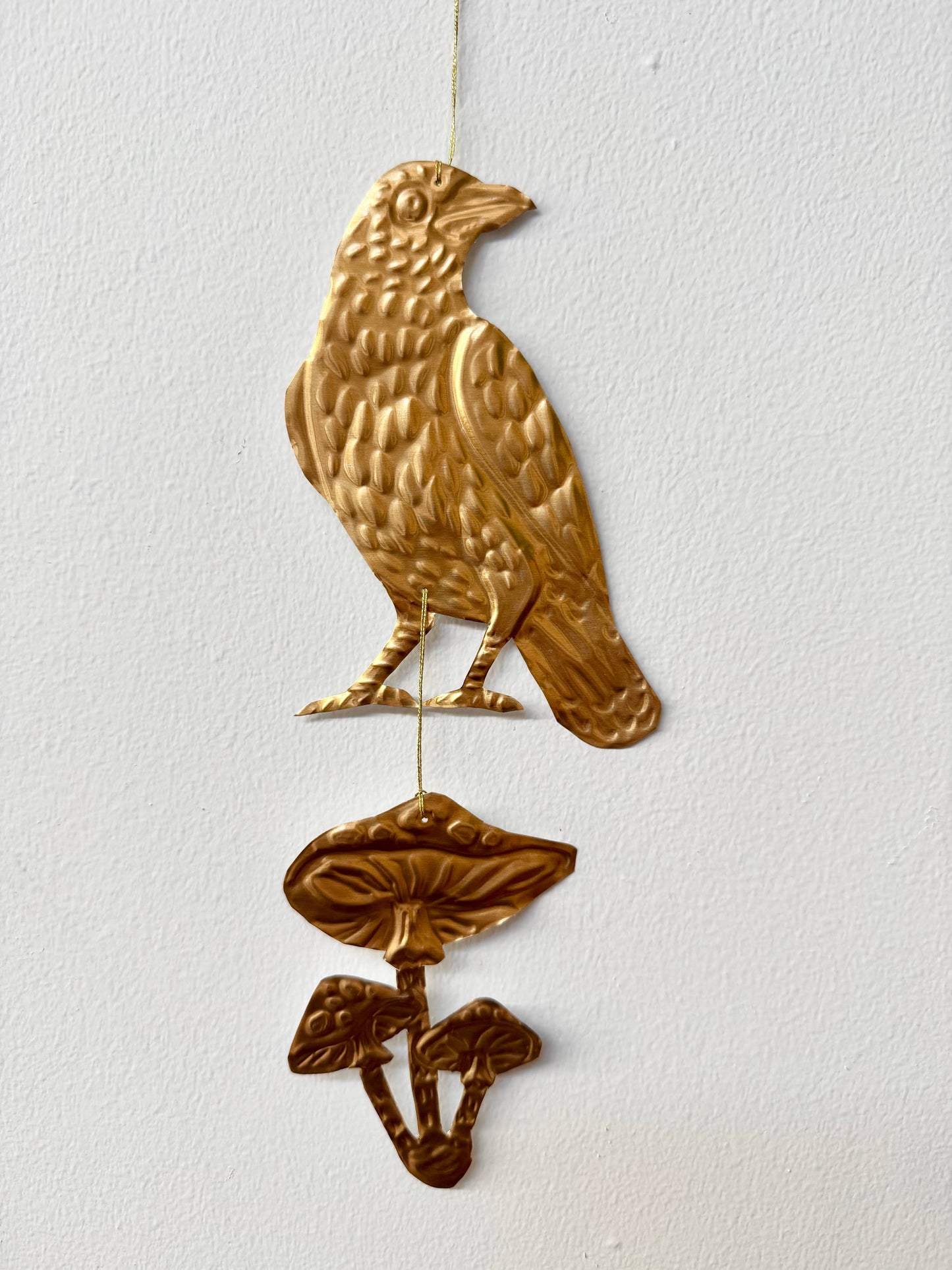 Embossed gold tin Crow and Mushrooms hanging decoration