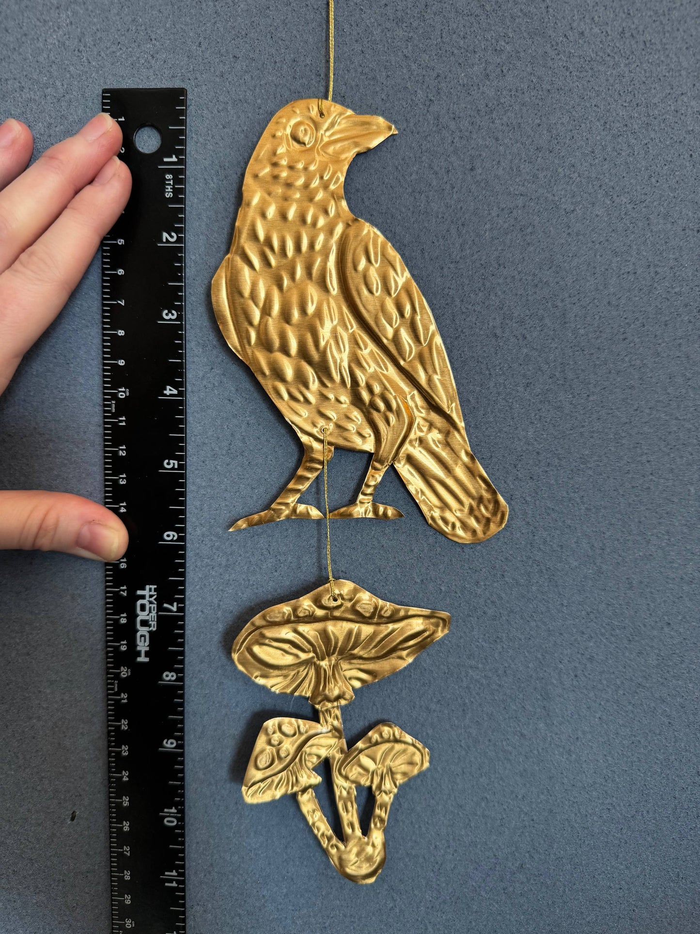 Embossed gold tin Crow and Mushrooms hanging decoration